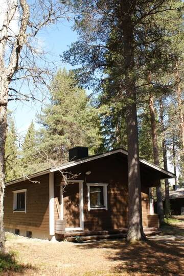 Фото номера Коттедж «Кеттула» Курортные отели Pyhän Asteli Log Cottages г. Пухатунтури 2