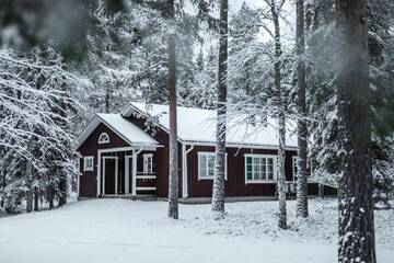 Фото номера Апартаменты с 2 спальнями и сауной Курортные отели Pyhän Asteli Log Cottages г. Пухатунтури 10