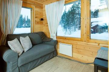Фото номера Апартаменты - Двухуровневые Дома для отпуска Pyhäkoti Holiday Home г. Пухатунтури 8