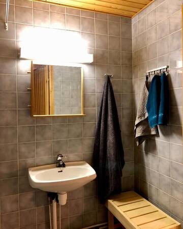 Фото номера Дом с 2 спальнями Дома для отпуска Lapland Lodge Pyhä - Ski in - ski out, sauna г. Пухатунтури 58